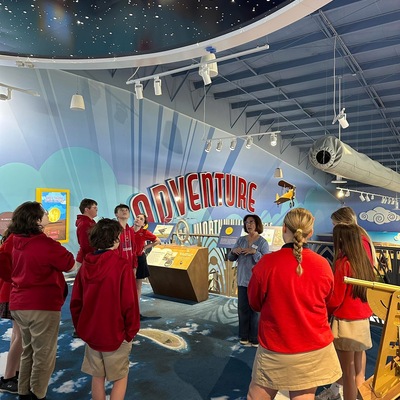 AEHM volunteer sharing mezzanine exhibits.