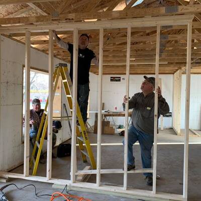 Volunteers building a new Habitat house.