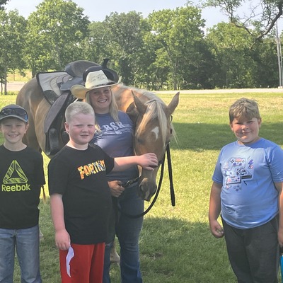 4-H Members at Rock Springs Ranch (4-H Camp) after learning about horse facts