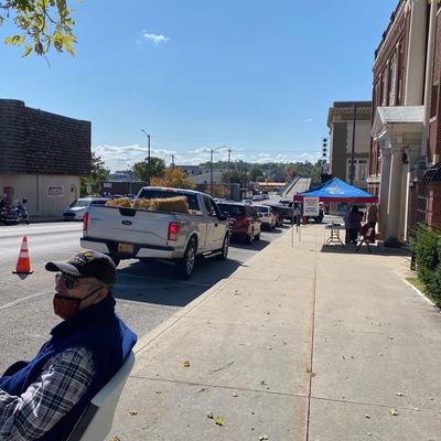 Cars line up at 5th and Kansas for a familiar and comforting taste of Oktoberfest