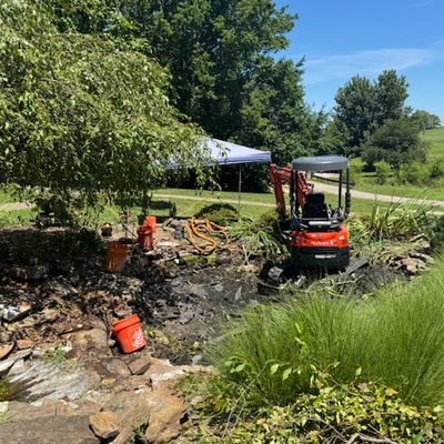 Getting ready to replace parts in Carrigan Pond.
